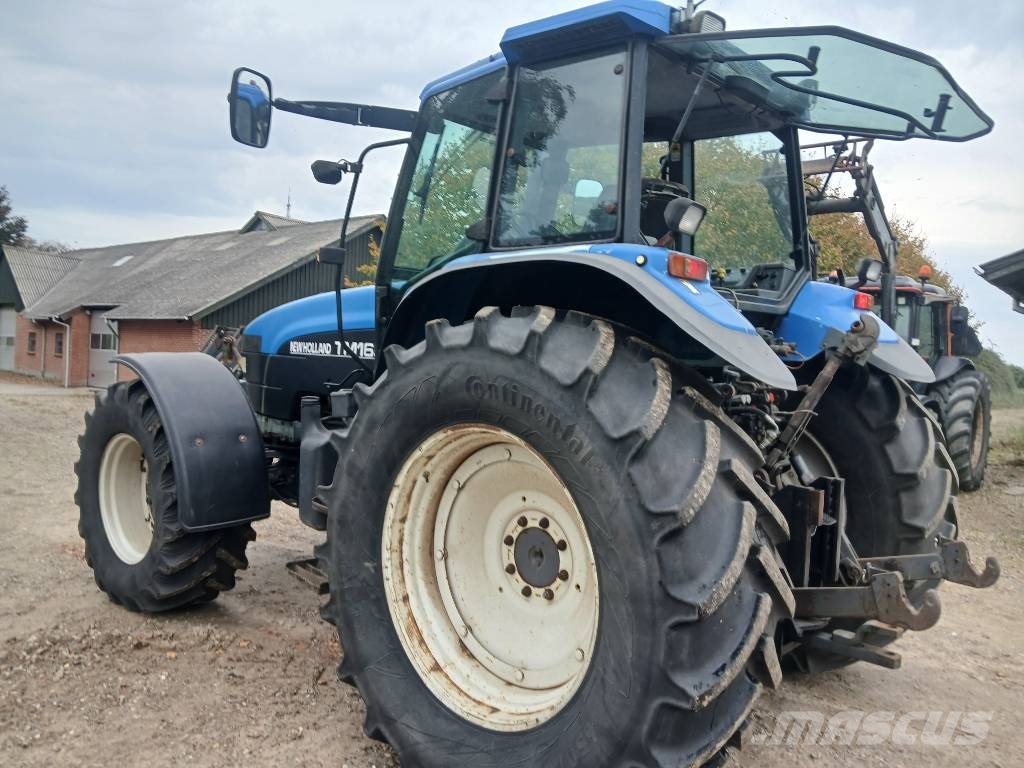 New Holland TM 165 med frontlift og front pto. Traktorji