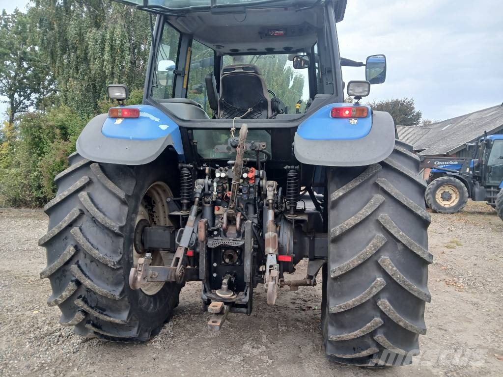 New Holland TM 165 med frontlift og front pto. Traktorji