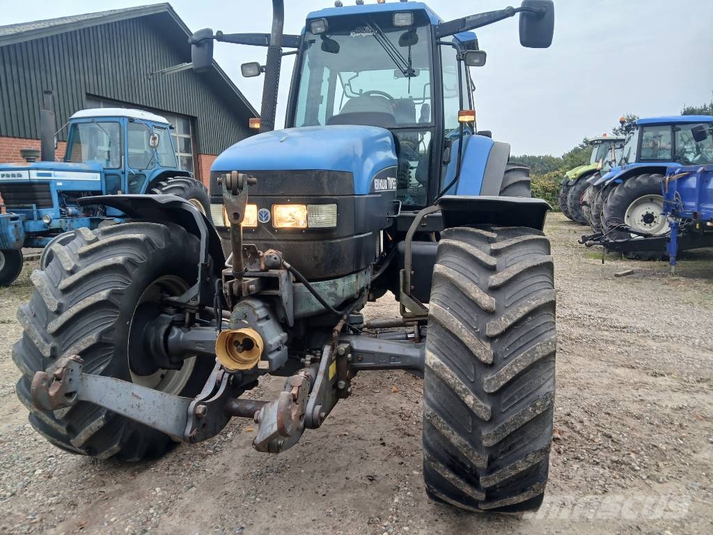 New Holland TM 165 med frontlift og front pto. Traktorji