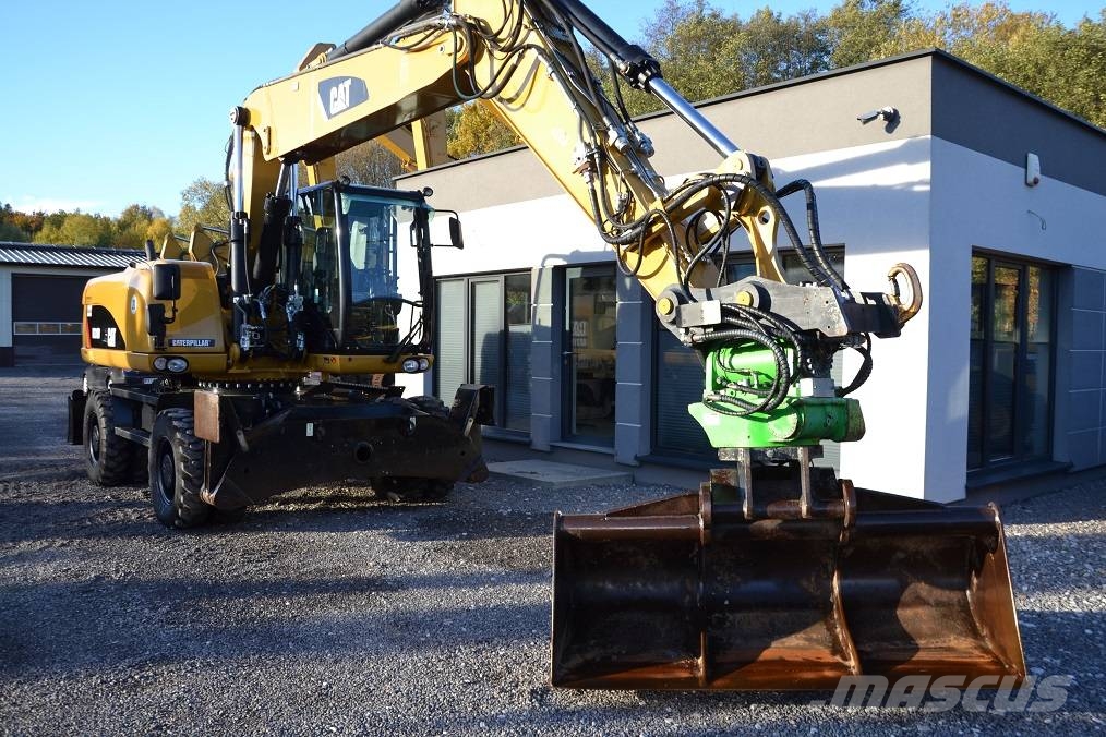 CAT M 318 D  ROTOTILT Колёсные экскаваторы