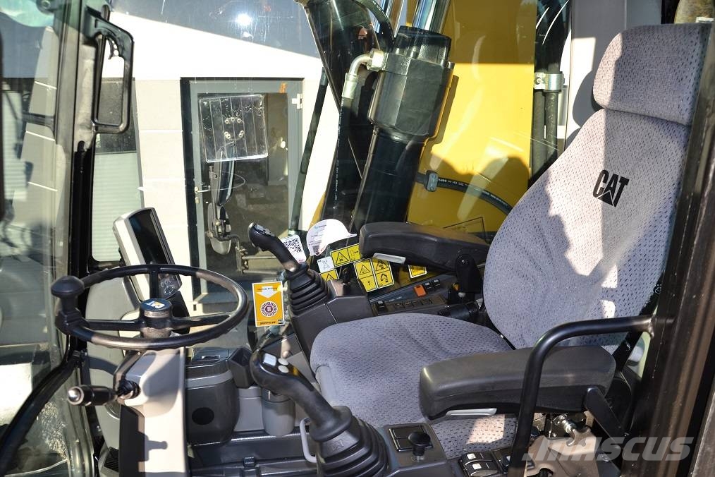 CAT M 318 D  ROTOTILT Колёсные экскаваторы