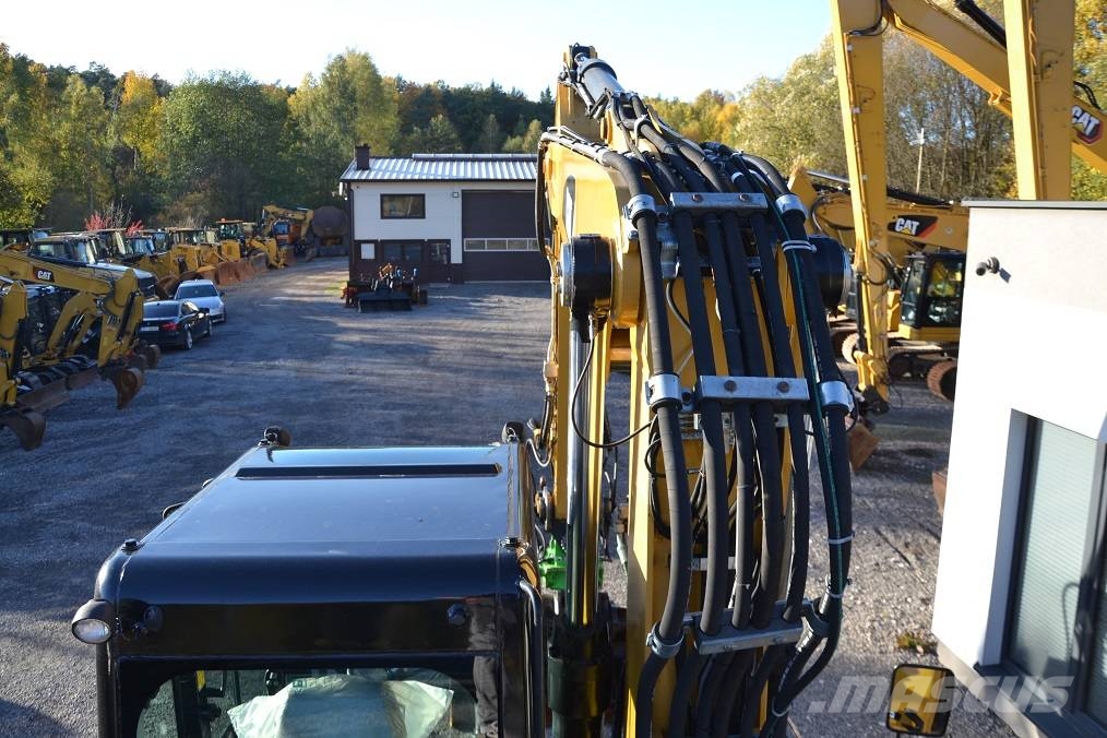 CAT M 318 D  ROTOTILT Колёсные экскаваторы