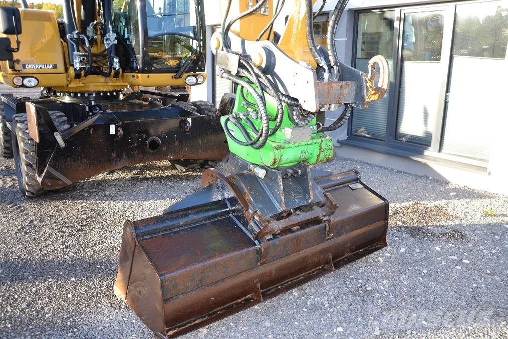 CAT M 318 D  ROTOTILT Колёсные экскаваторы