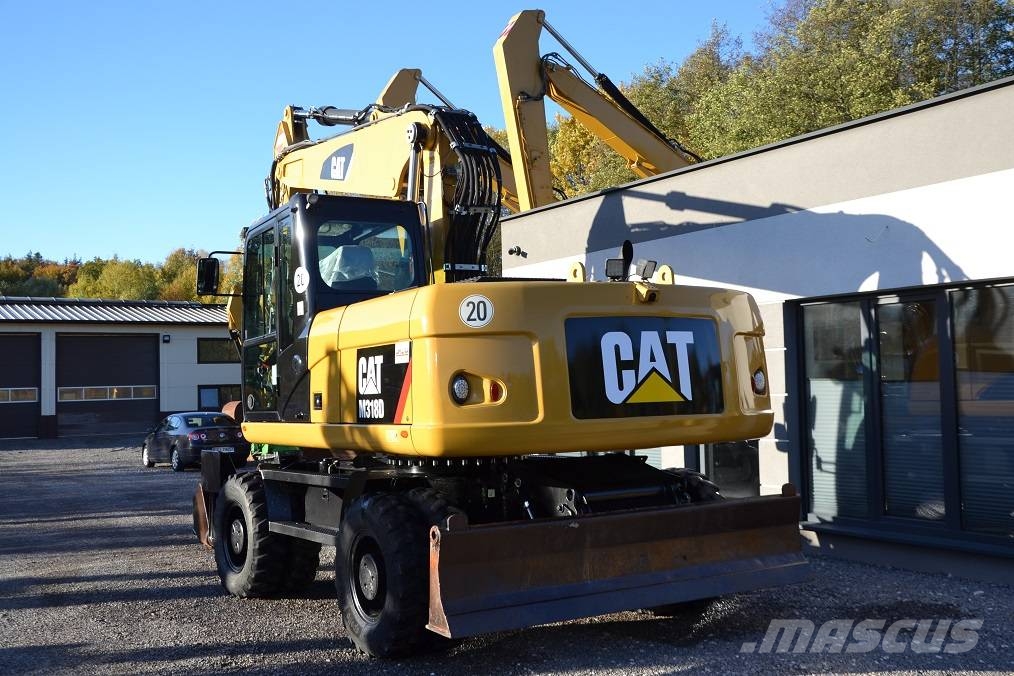 CAT M 318 D  ROTOTILT Колёсные экскаваторы