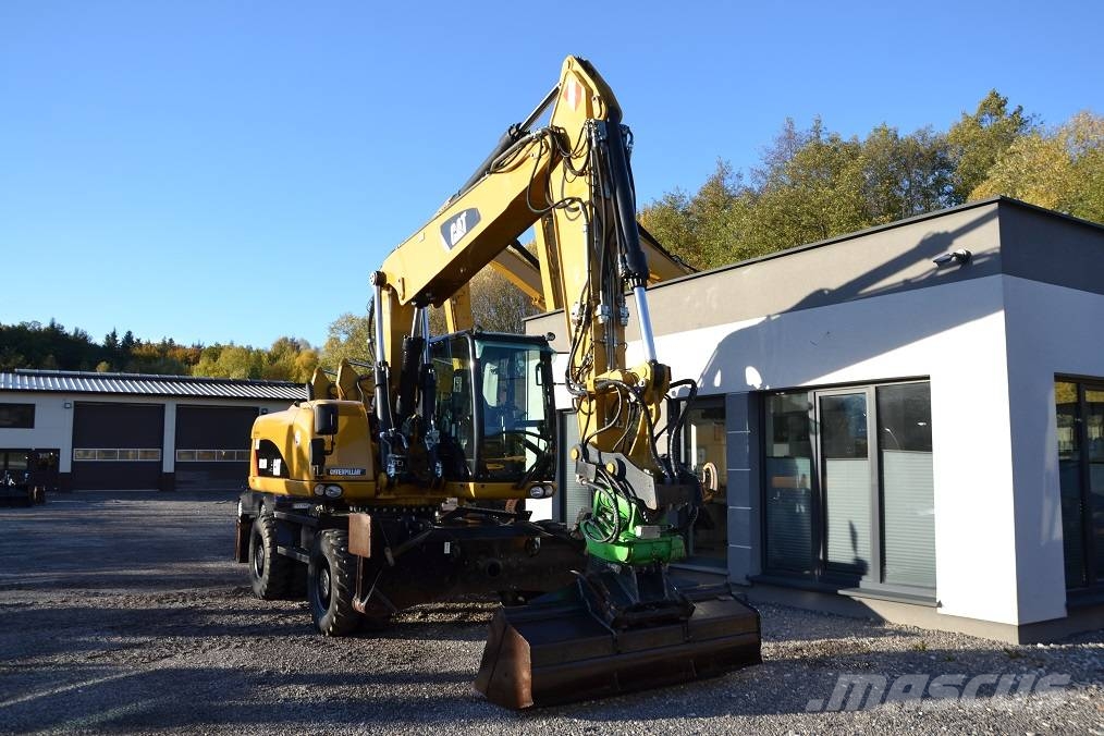 CAT M 318 D  ROTOTILT Колёсные экскаваторы