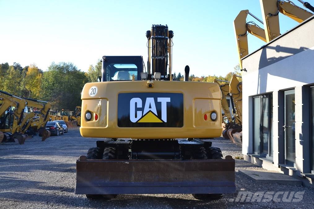 CAT M 318 D  ROTOTILT Колёсные экскаваторы