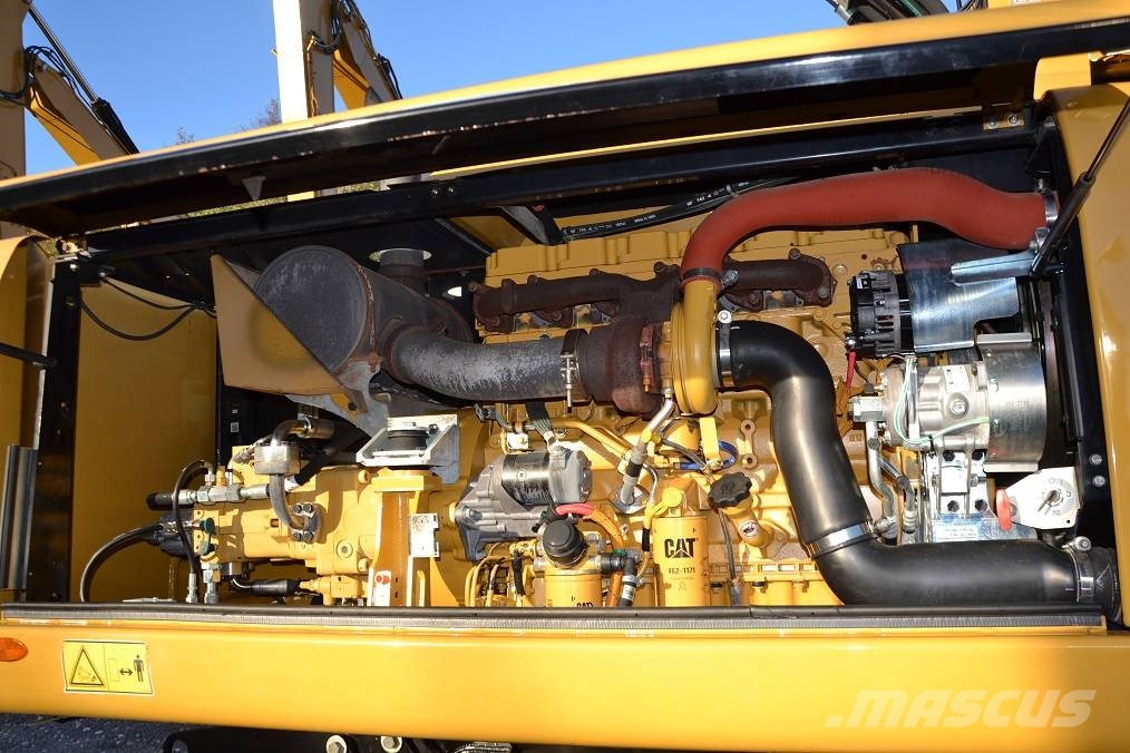 CAT M 318 D  ROTOTILT Колёсные экскаваторы