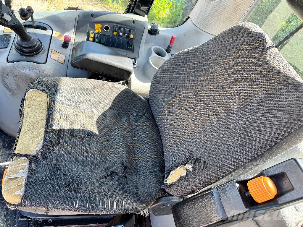 New Holland W 170 لوادر بعجل