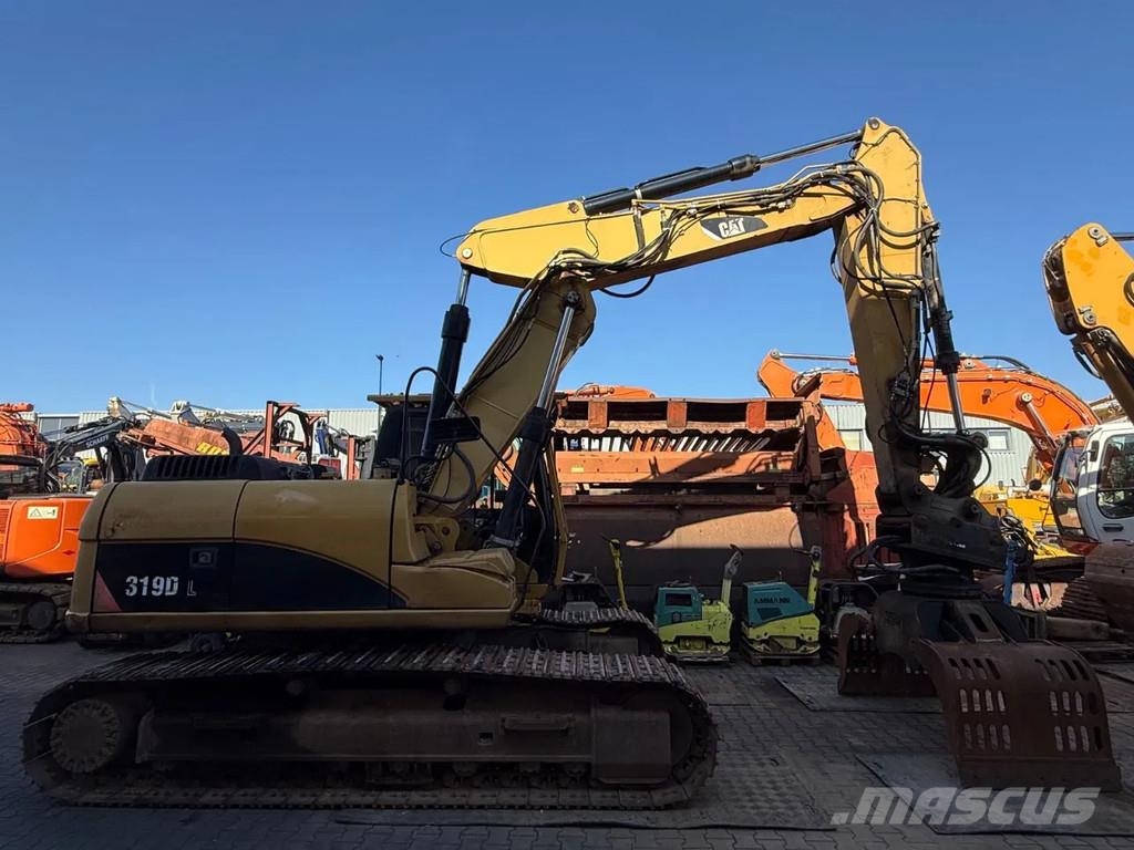 CAT 319D Pásová rýpadla