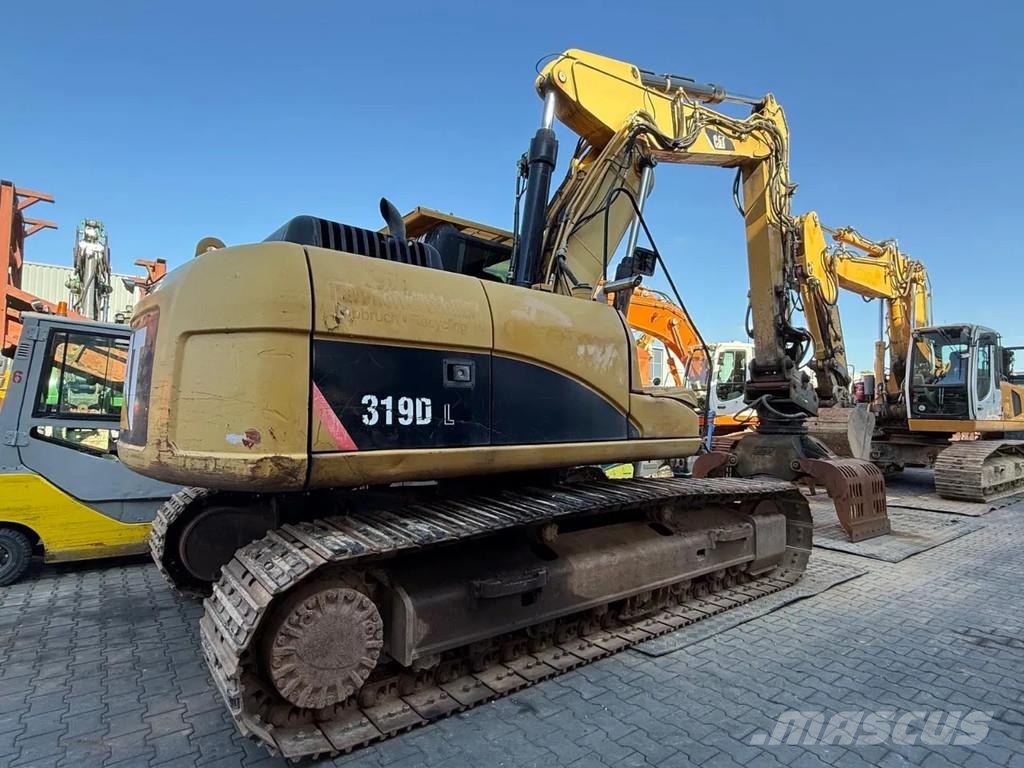 CAT 319D Pásová rýpadla