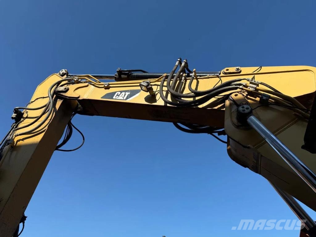 CAT 319D Pásová rýpadla