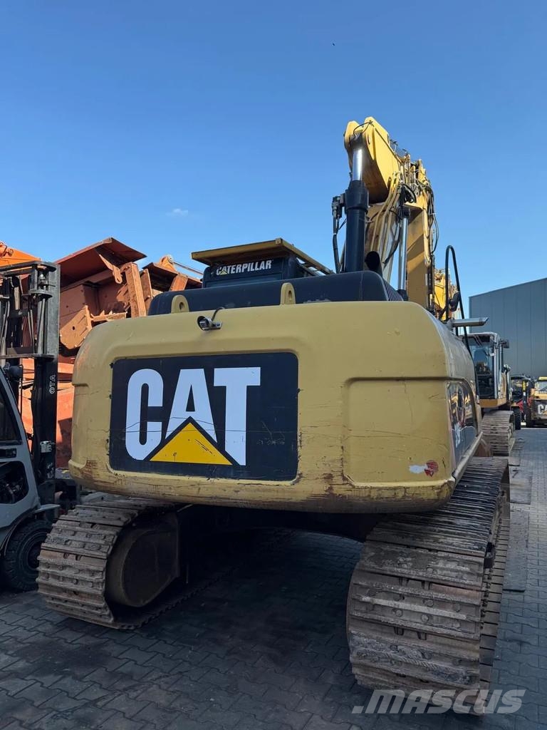 CAT 319D Pásová rýpadla