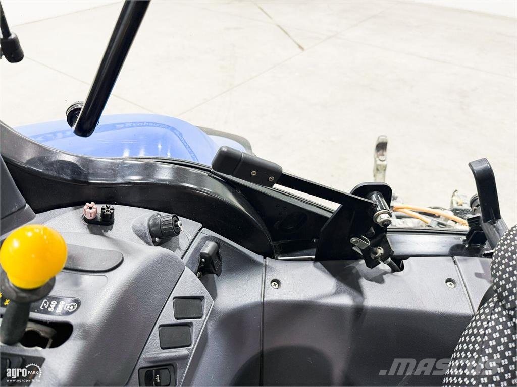 New Holland T6040 Elite 17/16 Electro Command, rugózott híd, r Traktory