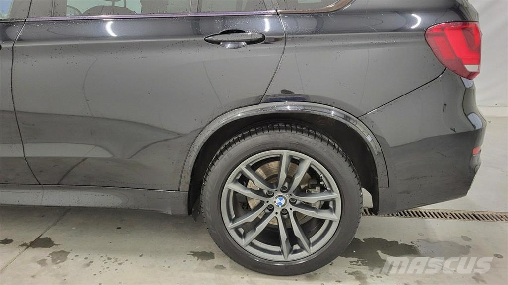 BMW X5 Автомобілі