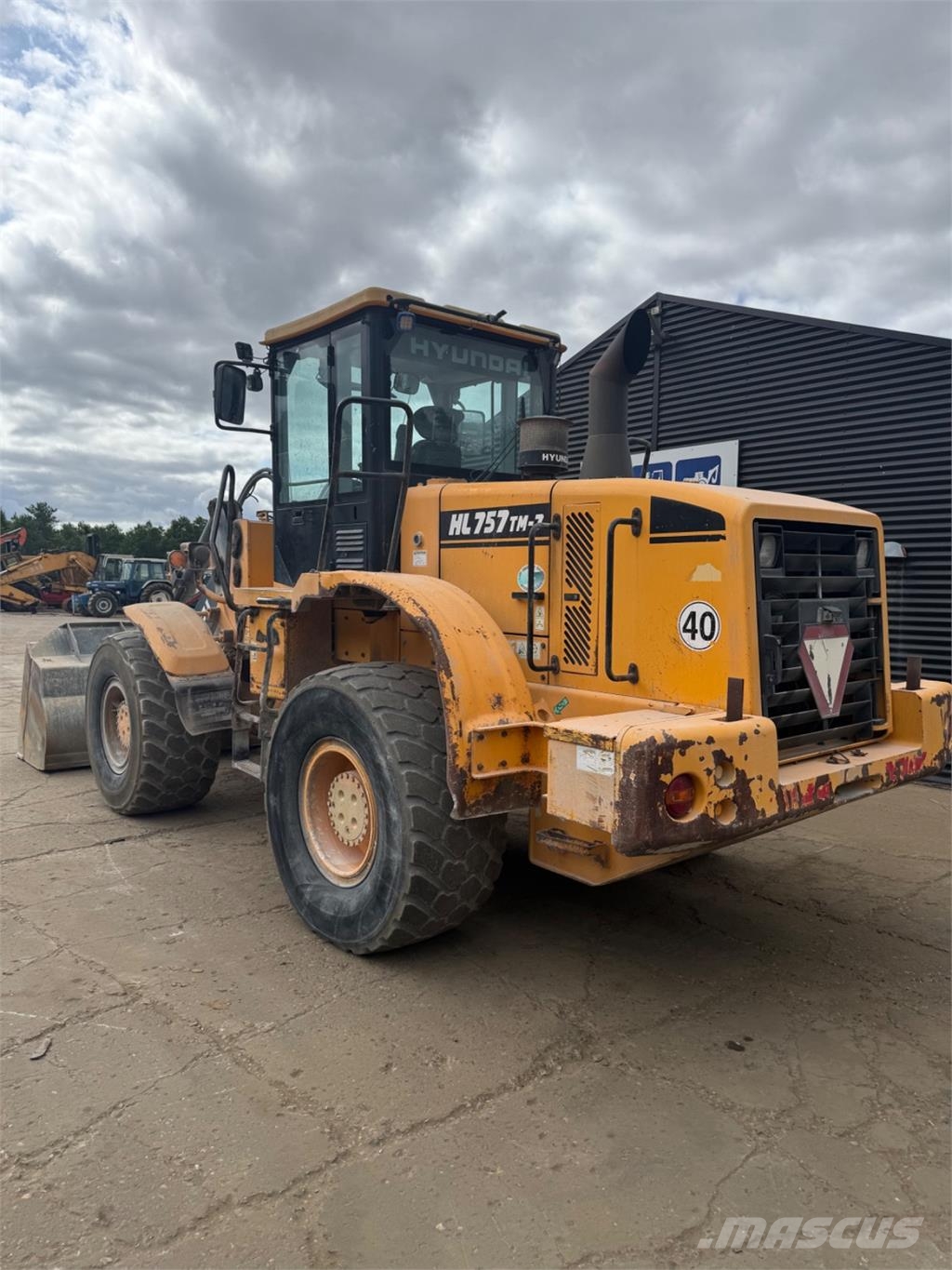 Hyundai HL757 TM-7 لوادر بعجل