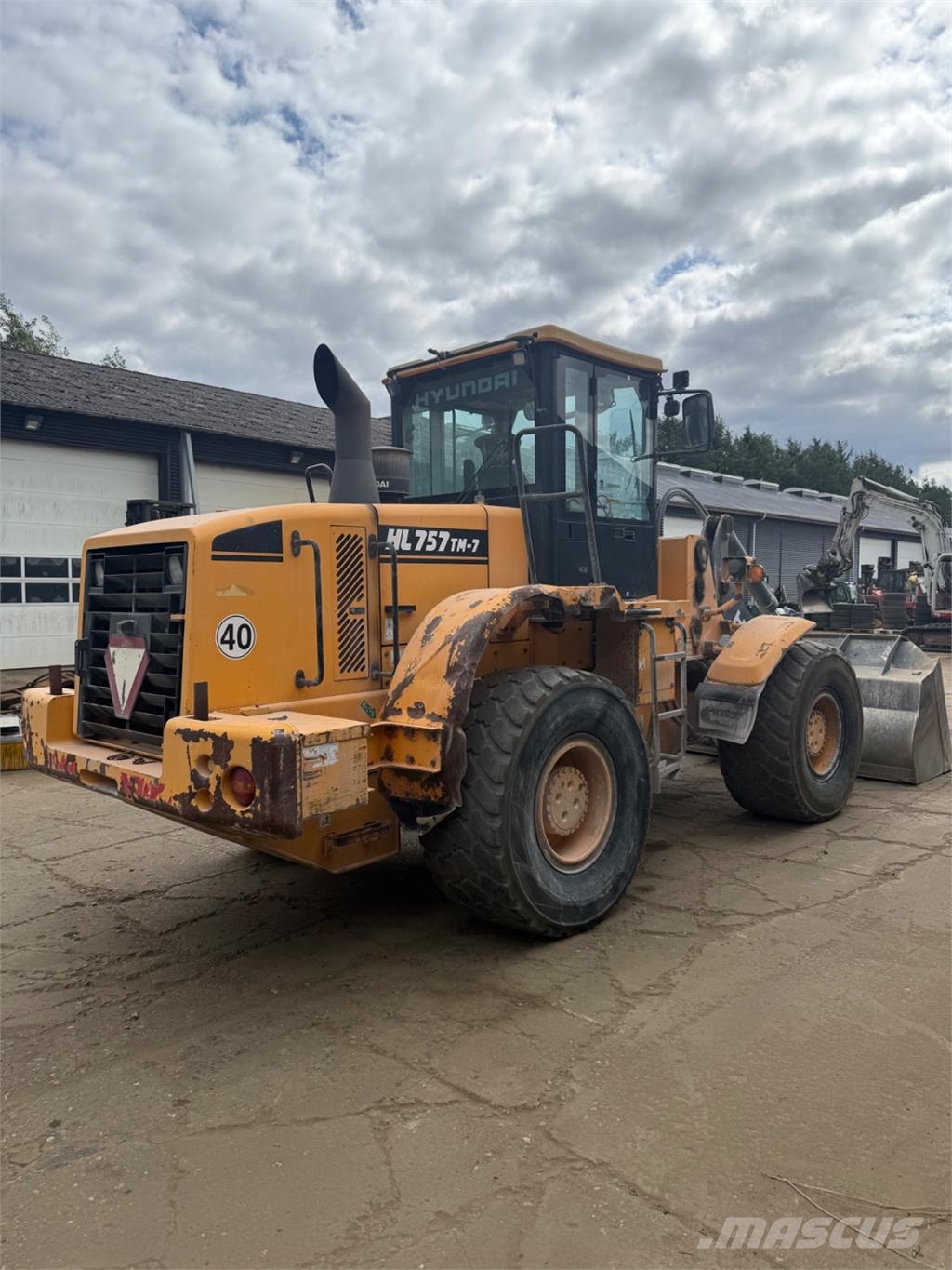 Hyundai HL757 TM-7 لوادر بعجل