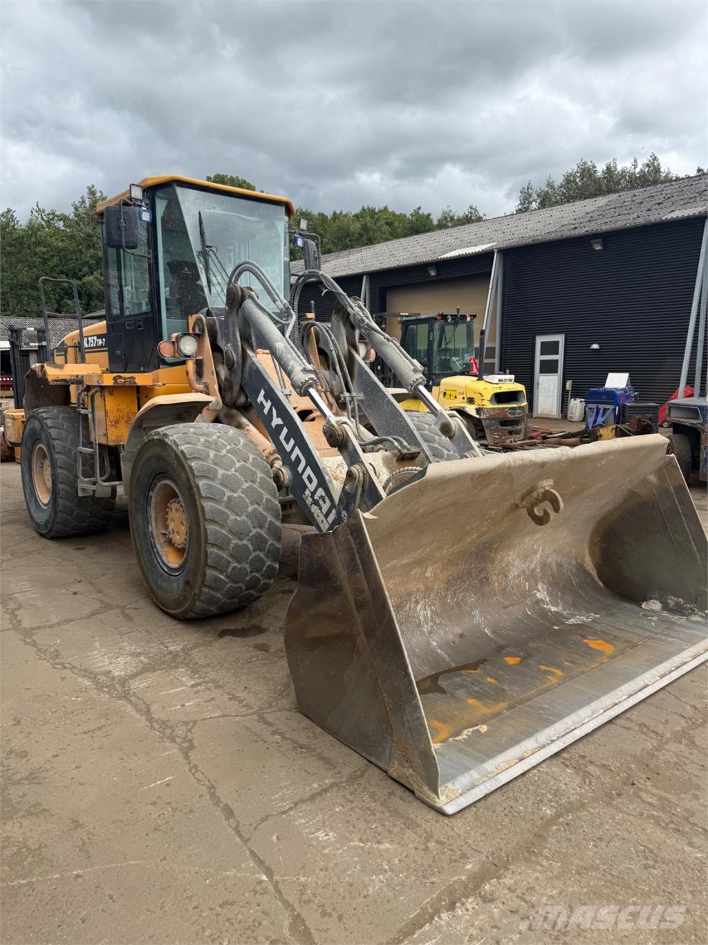 Hyundai HL757 TM-7 لوادر بعجل