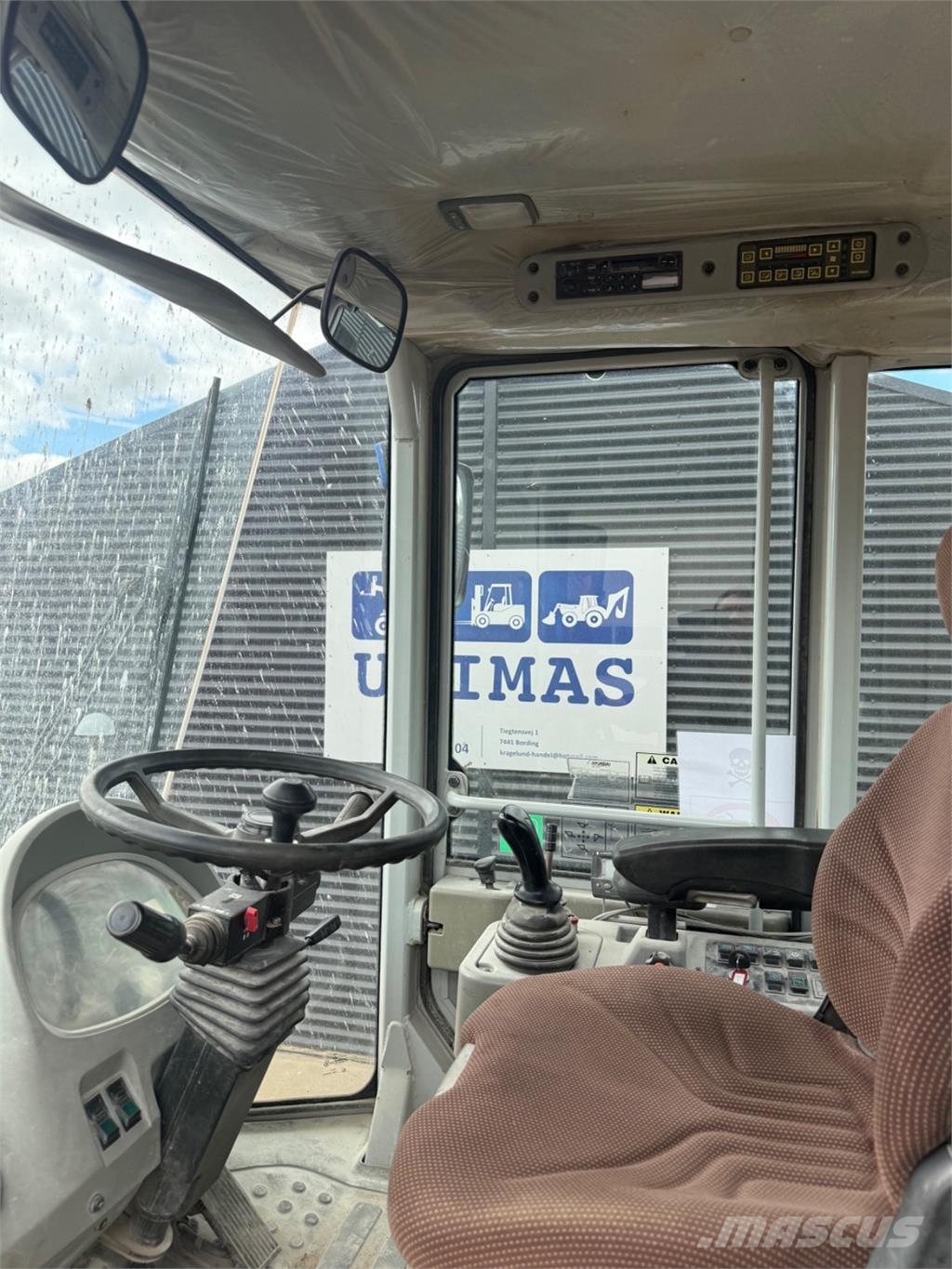 Hyundai HL757 TM-7 لوادر بعجل