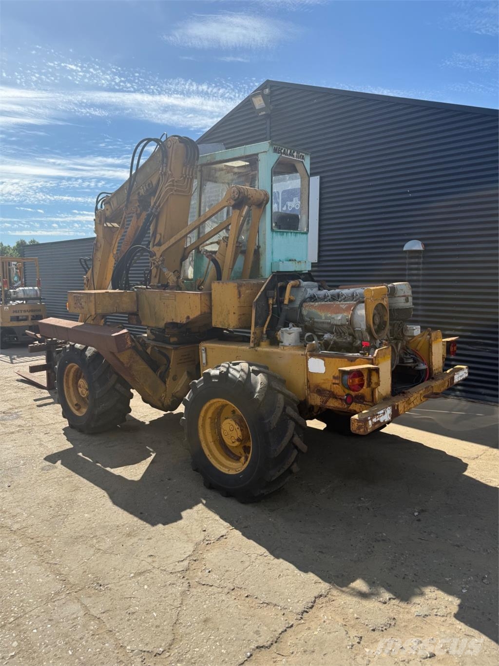 Mecalac CX11 لوادر بعجل