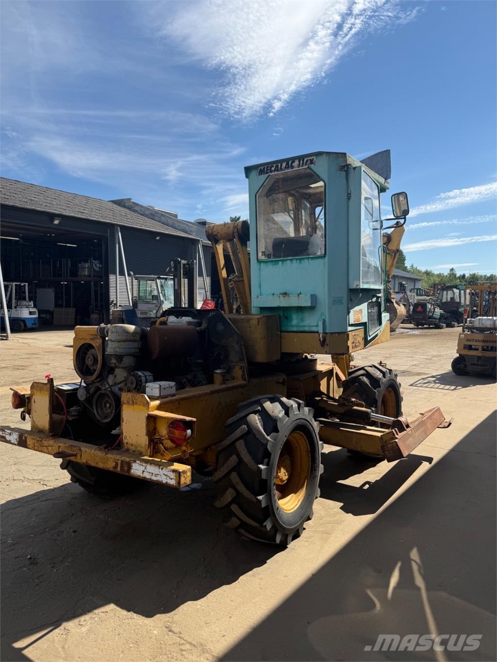 Mecalac CX11 لوادر بعجل