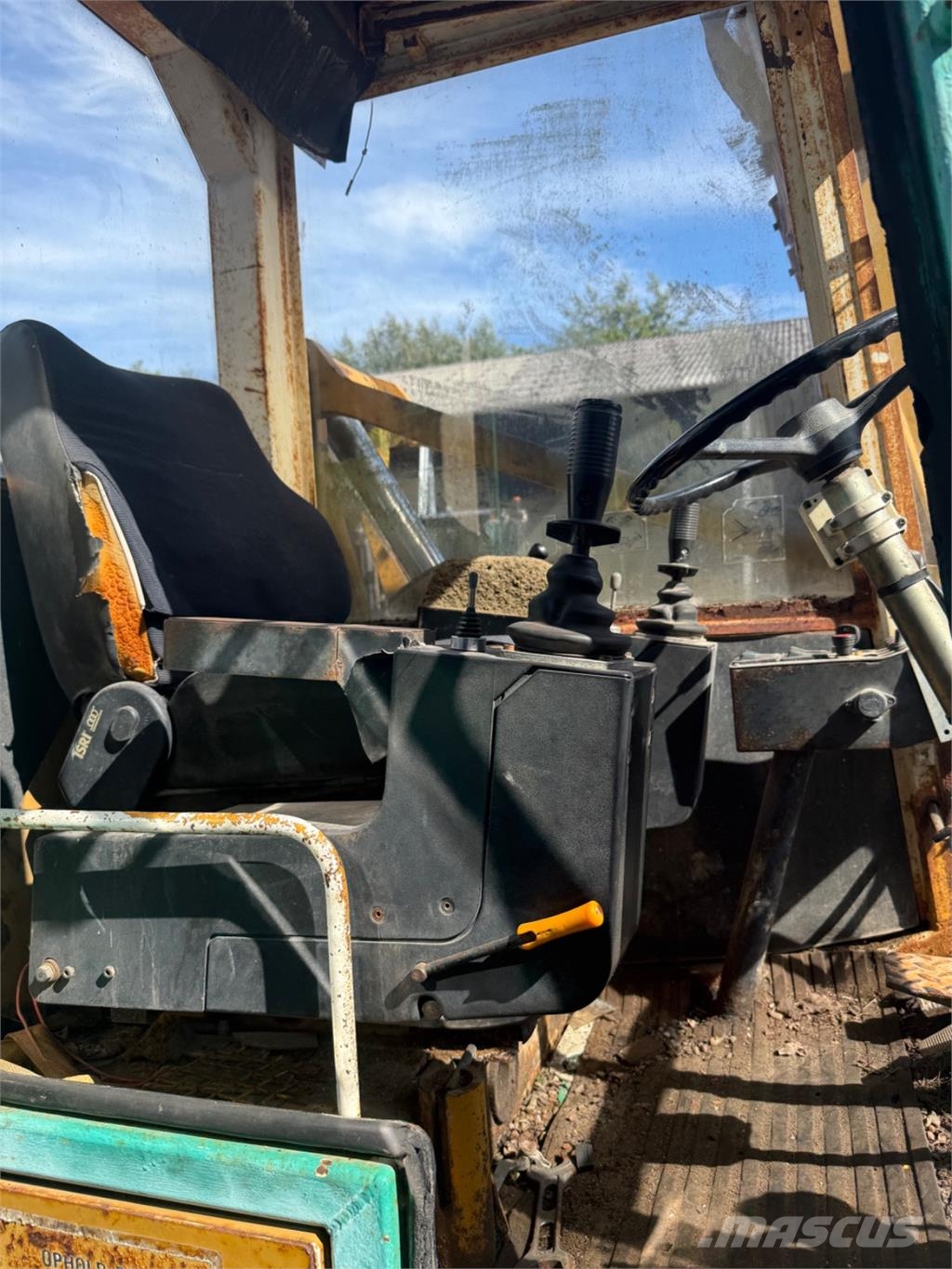Mecalac CX11 لوادر بعجل
