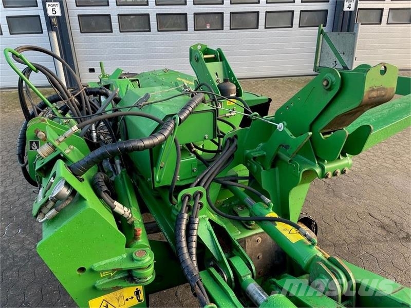 John Deere 388 med crimper Vālotāji