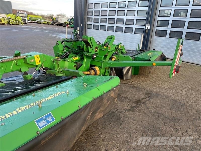 John Deere 388 med crimper Vālotāji