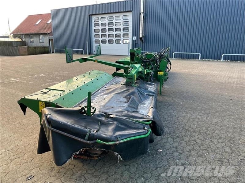 John Deere 388 med crimper Vālotāji