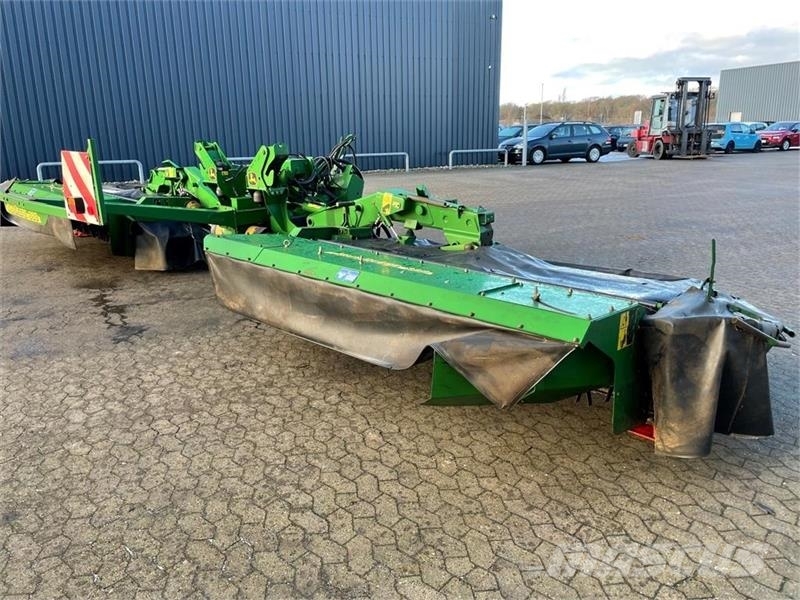John Deere 388 med crimper Vālotāji