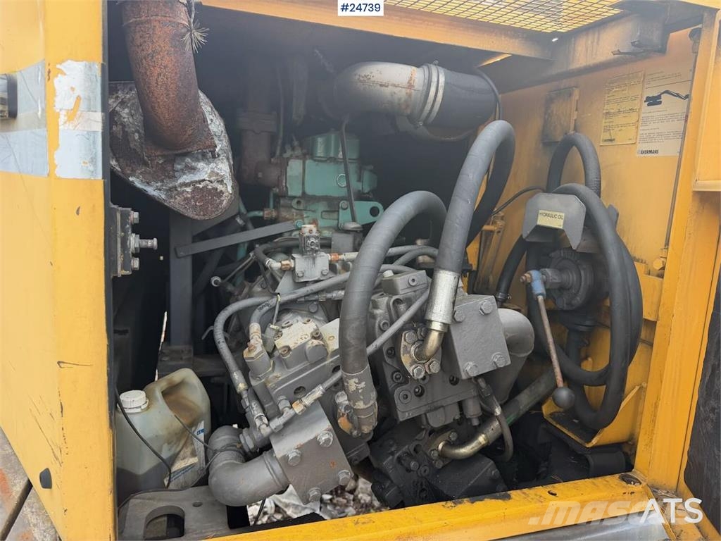 Åkerman EW230 wheeled excavator with two buckets and tiltr Escavatori gommati