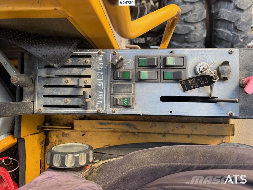 Åkerman EW230 wheeled excavator with two buckets and tiltr Escavatori gommati