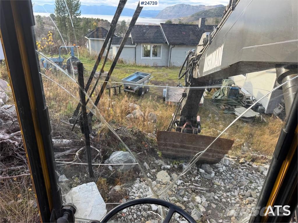 Åkerman EW230 wheeled excavator with two buckets and tiltr Escavatori gommati