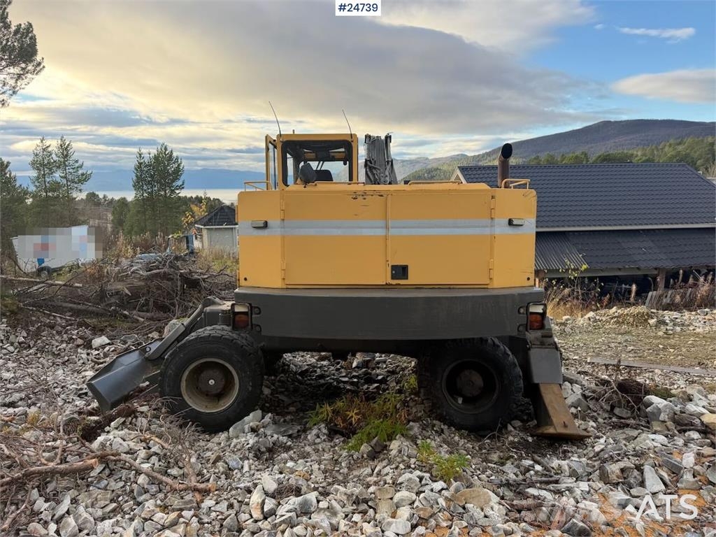 Åkerman EW230 wheeled excavator with two buckets and tiltr Escavatori gommati