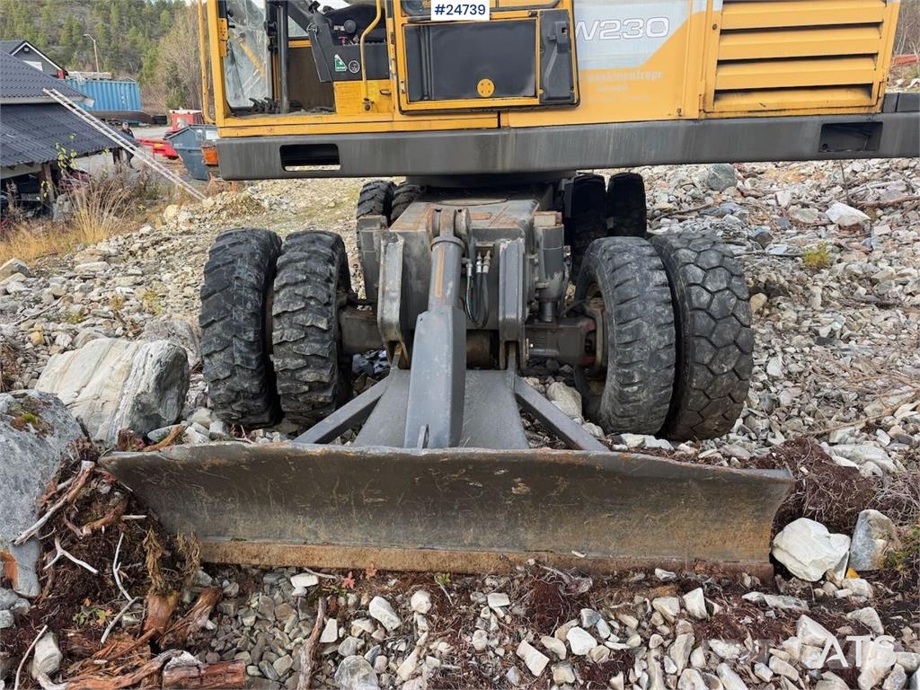 Åkerman EW230 wheeled excavator with two buckets and tiltr Escavatori gommati