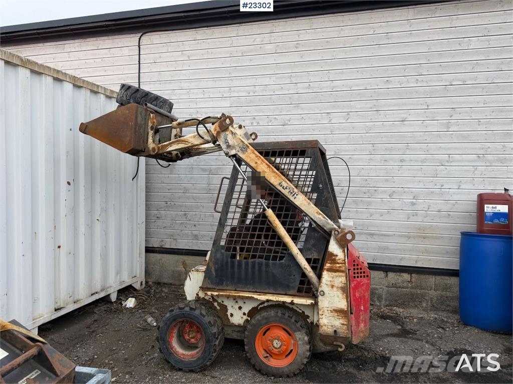 Bobcat 34.3 skid steer loader w/ extra tires and bucket.  Kompaktlastere