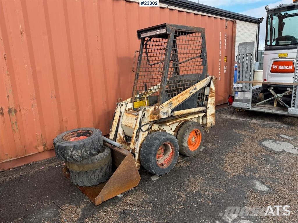 Bobcat 34.3 skid steer loader w/ extra tires and bucket.  Kompaktlastere