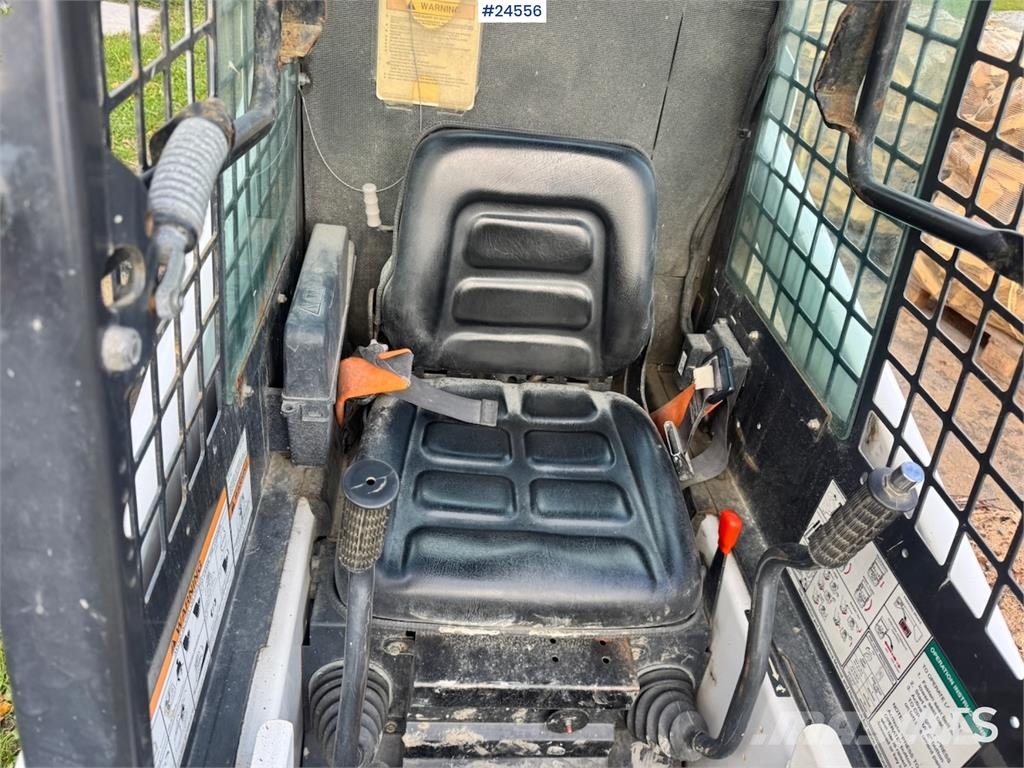 Bobcat S70 Compact Loader with Sweeper, Bucket and Pallet Lietoti riteņu kompaktiekrāvēji