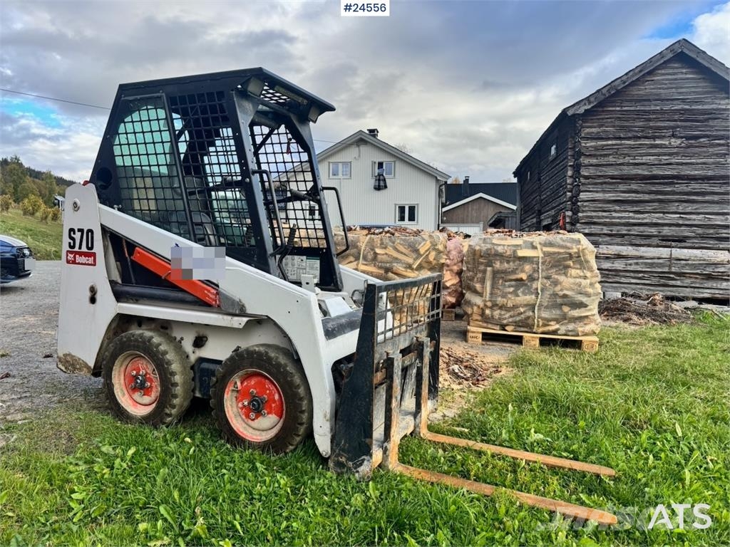 Bobcat S70 Compact Loader with Sweeper, Bucket and Pallet Lietoti riteņu kompaktiekrāvēji