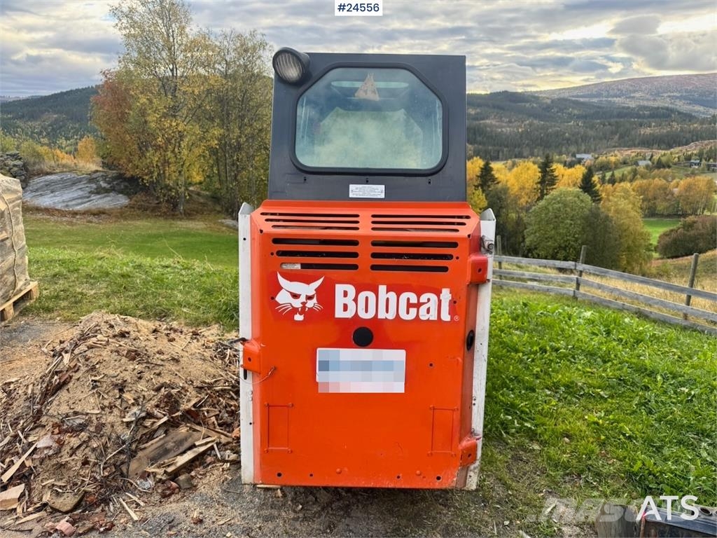 Bobcat S70 Compact Loader with Sweeper, Bucket and Pallet Lietoti riteņu kompaktiekrāvēji