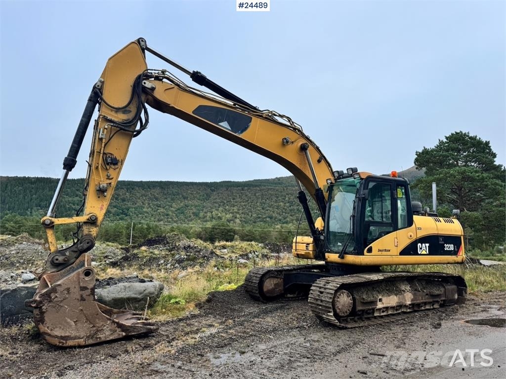 CAT 323DL Bageri gusjeničari