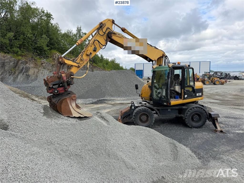 CAT M313C Excavadoras de ruedas