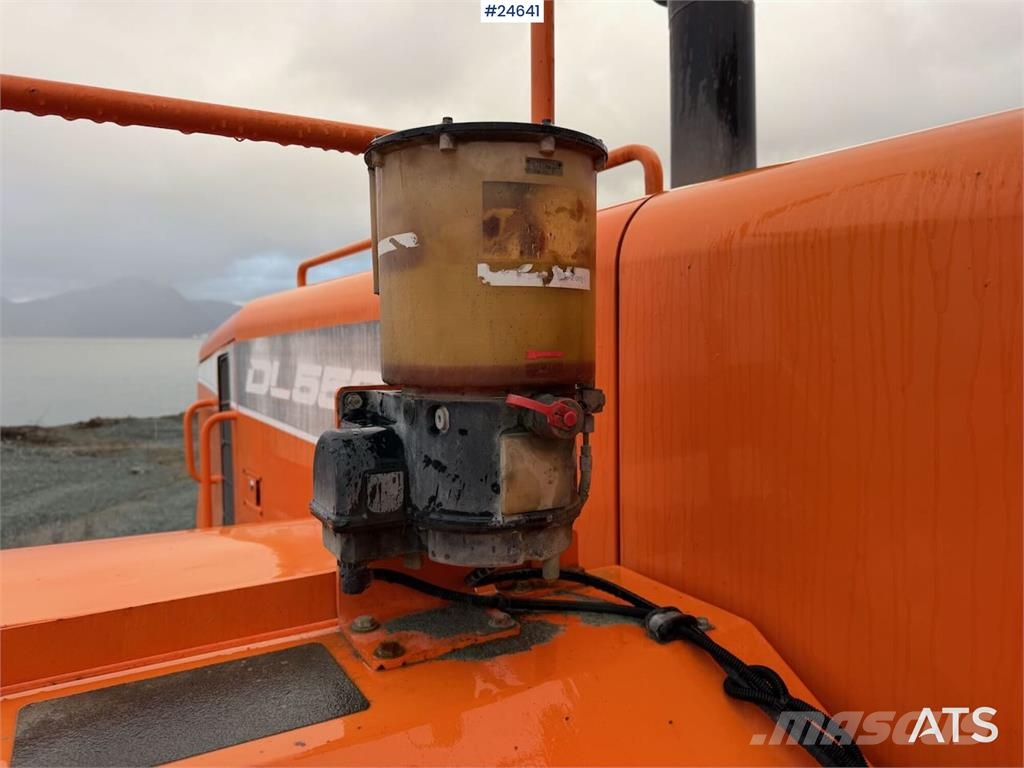 Doosan DL550-5 wheel loader with scale, bucket, and new t Hjullastere