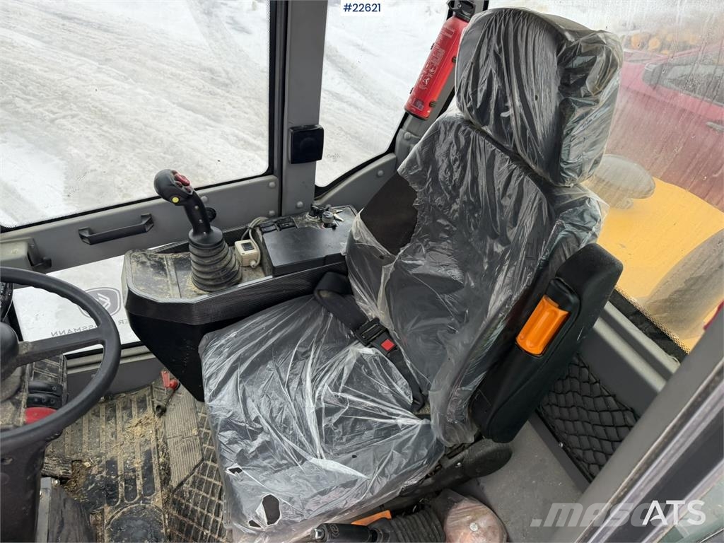 Günter Grossmann Ladowarka GG2500T telehandler with a bucket and l Teleskop-Radlader