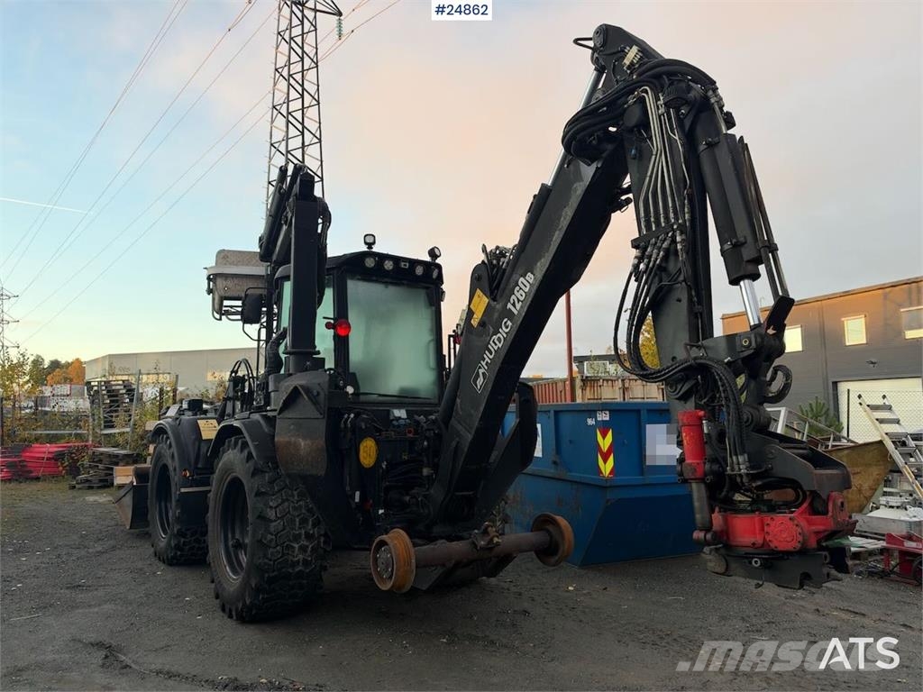 Huddig 1260B Backhoe loader with rail wheels – 3 buckets, لوادر ذات جرافات عكسية