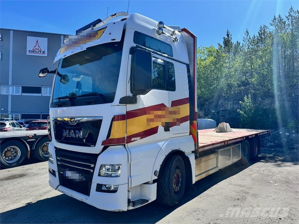 MAN TGX 580 Flatbed truck. Caminhões de mesa/dropside