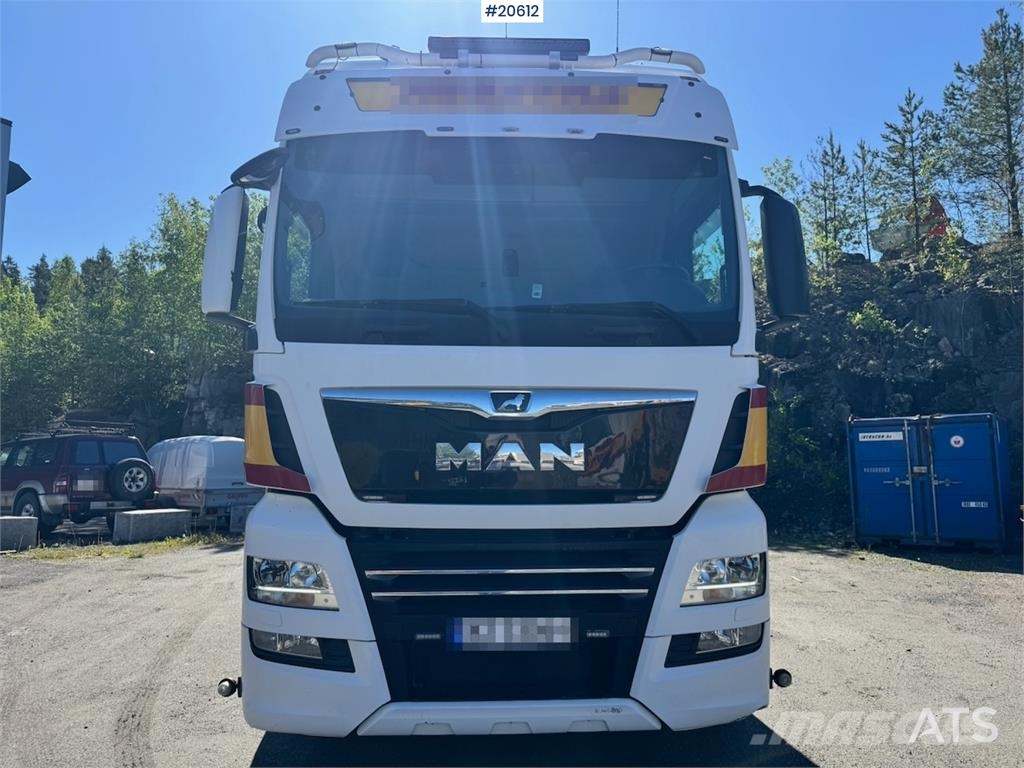 MAN TGX 580 Flatbed truck. Caminhões de mesa/dropside