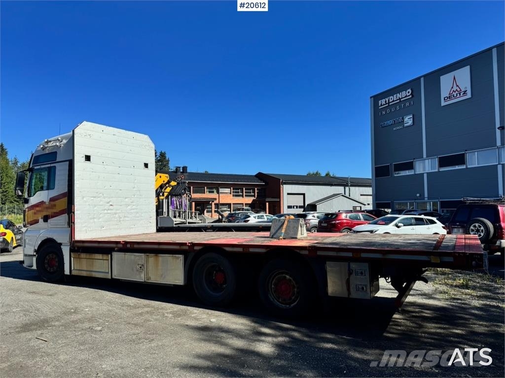 MAN TGX 580 Flatbed truck. Caminhões de mesa/dropside