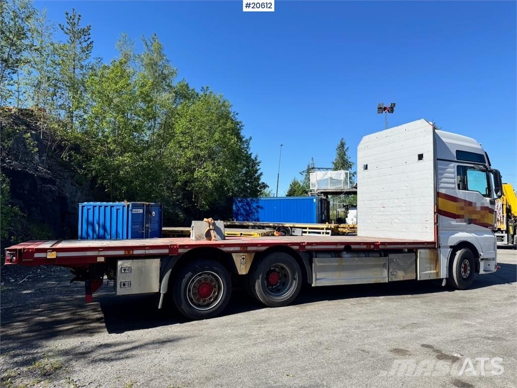 MAN TGX 580 Flatbed truck. Caminhões de mesa/dropside