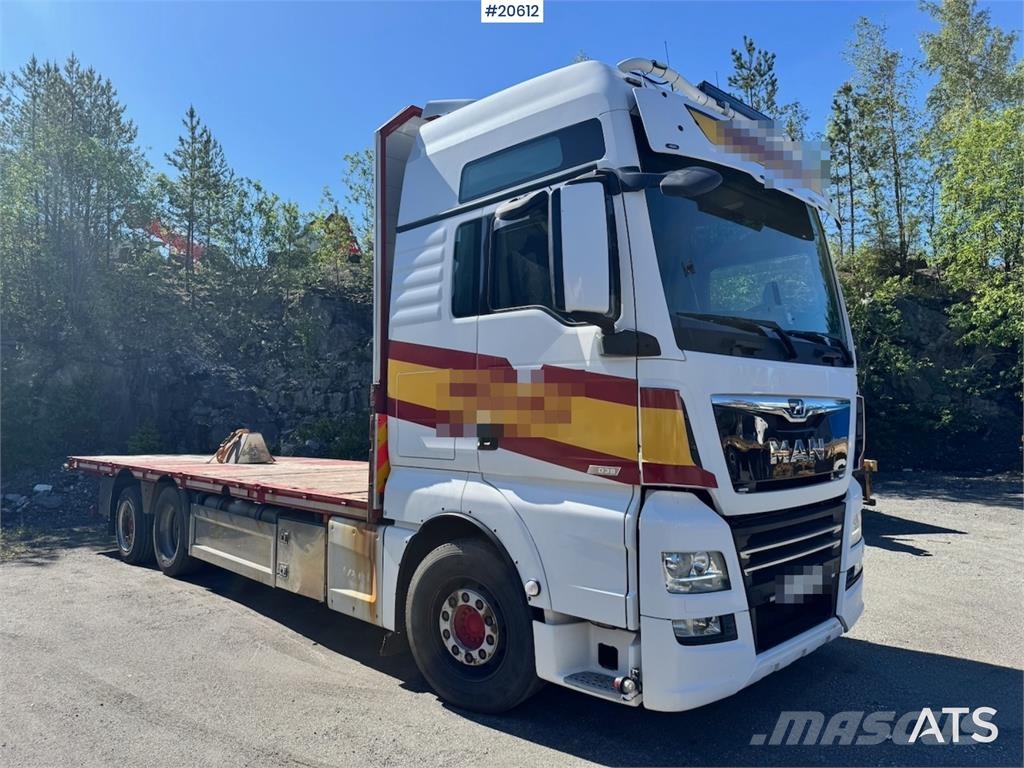 MAN TGX 580 Flatbed truck. Caminhões de mesa/dropside
