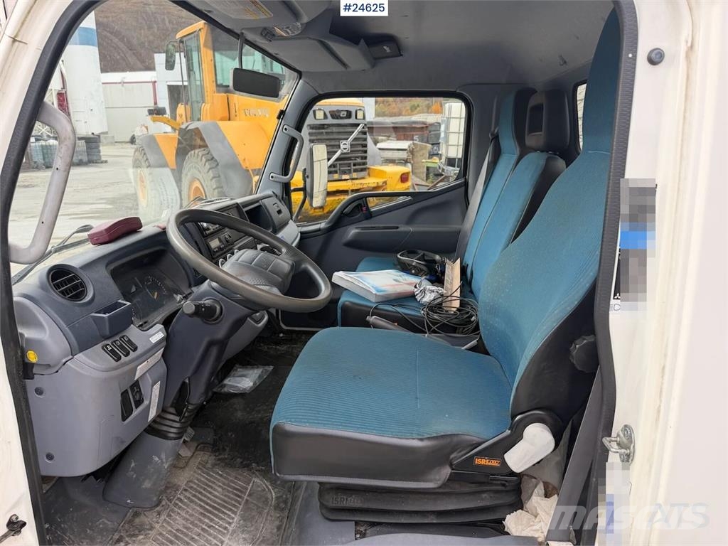 Mitsubishi Fuso Canter 4x2 with rear-mounted crane. Recently Kranbil